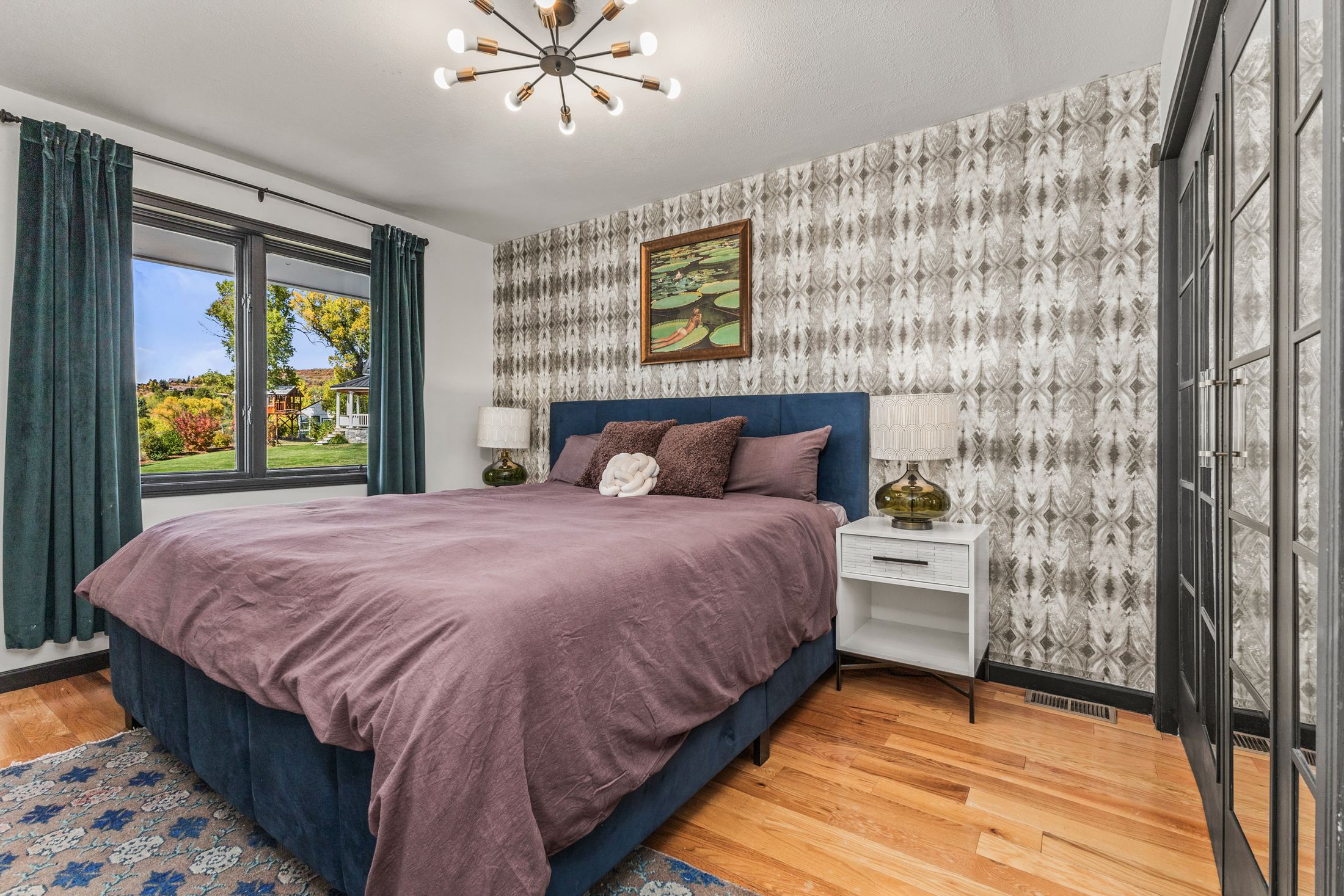 Bedroom with navy headboard