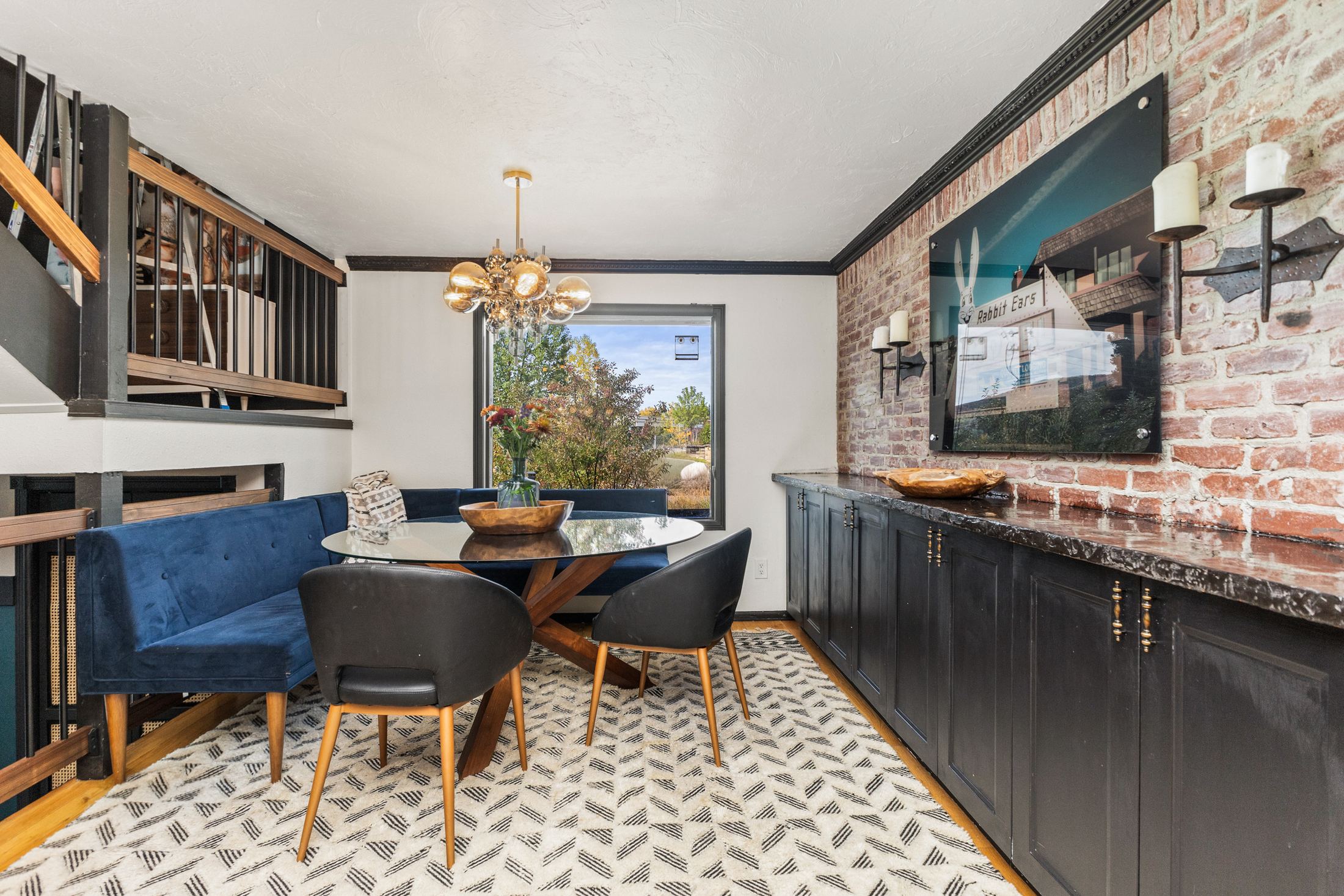 Brick dining banquette with mounted antelope